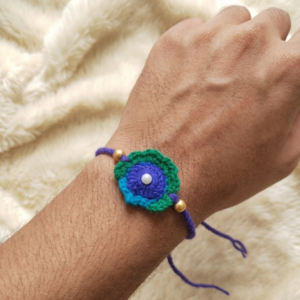 Peacock Feather Rakhi | Handmade Crochet Rakhi